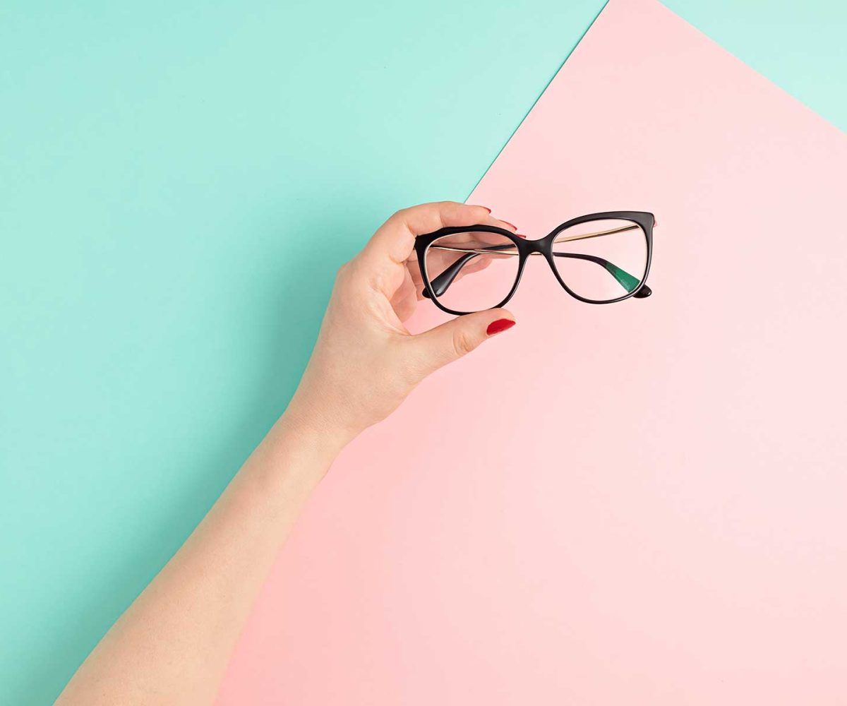 woman-hand-holding-eyeglasses-optical-store-glas-2021-06-24-17-12-49-utc.jpg